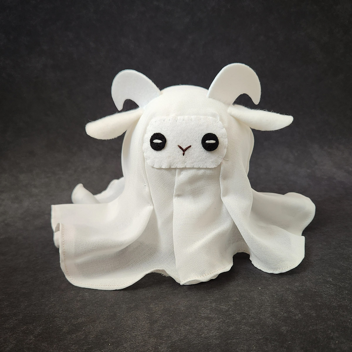 soft sculpture of a ghostly goat ghostie by Taneko Says Hello