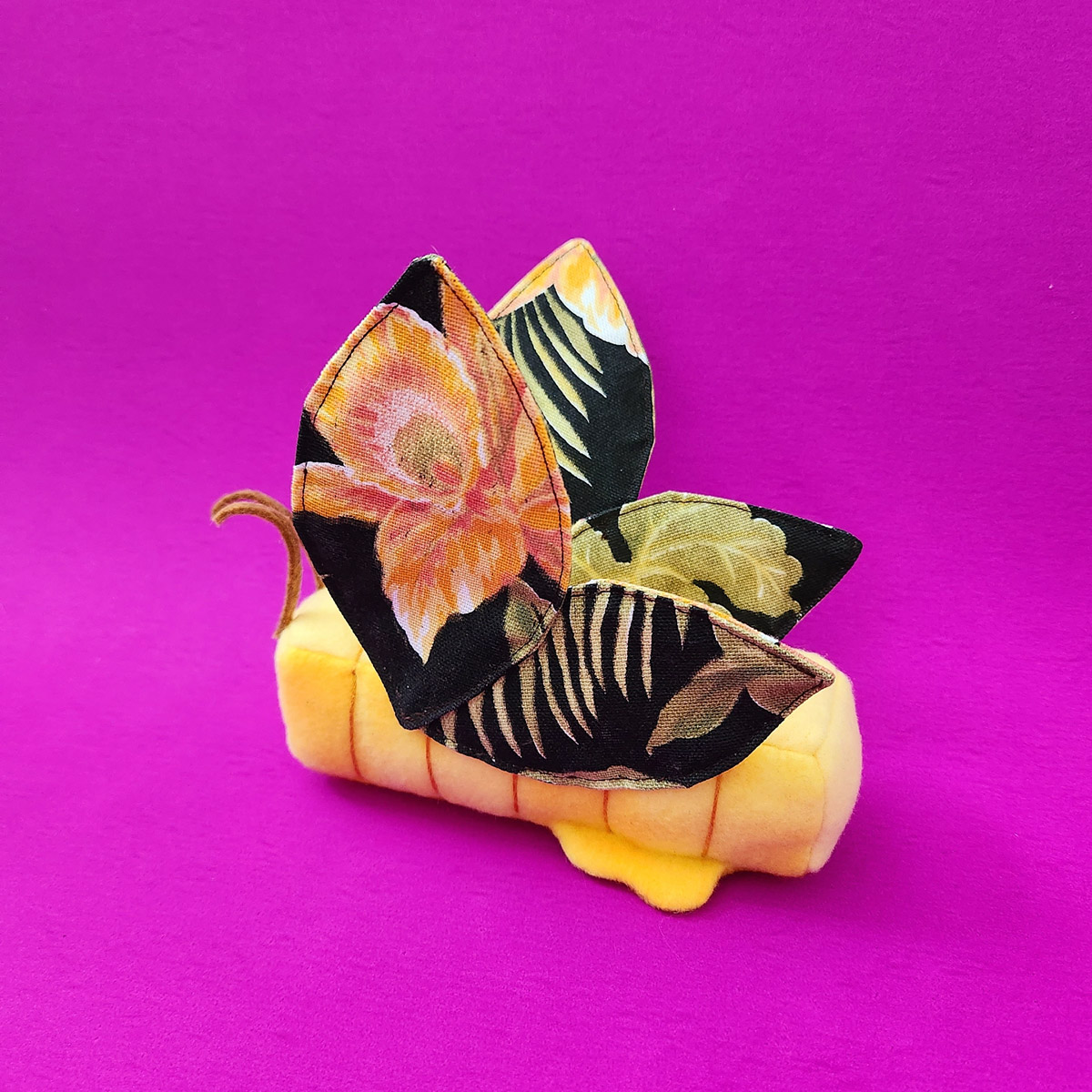 Butter Butterfly plush with dark floral wings by Taneko Says Hello