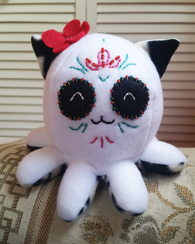 sugar skull Taneko featuring beads and hand embroidery