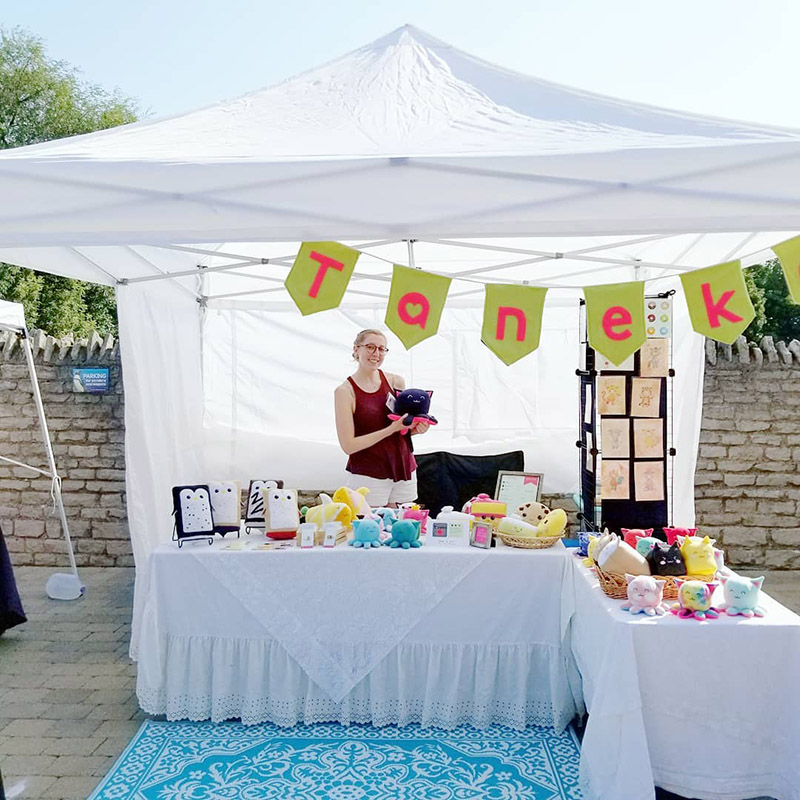 Taneko Says Hello booth display at Wild About Art Toledo Zoo