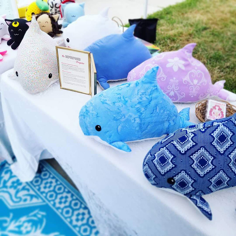 Repurposed Porpoises on art fair booth table