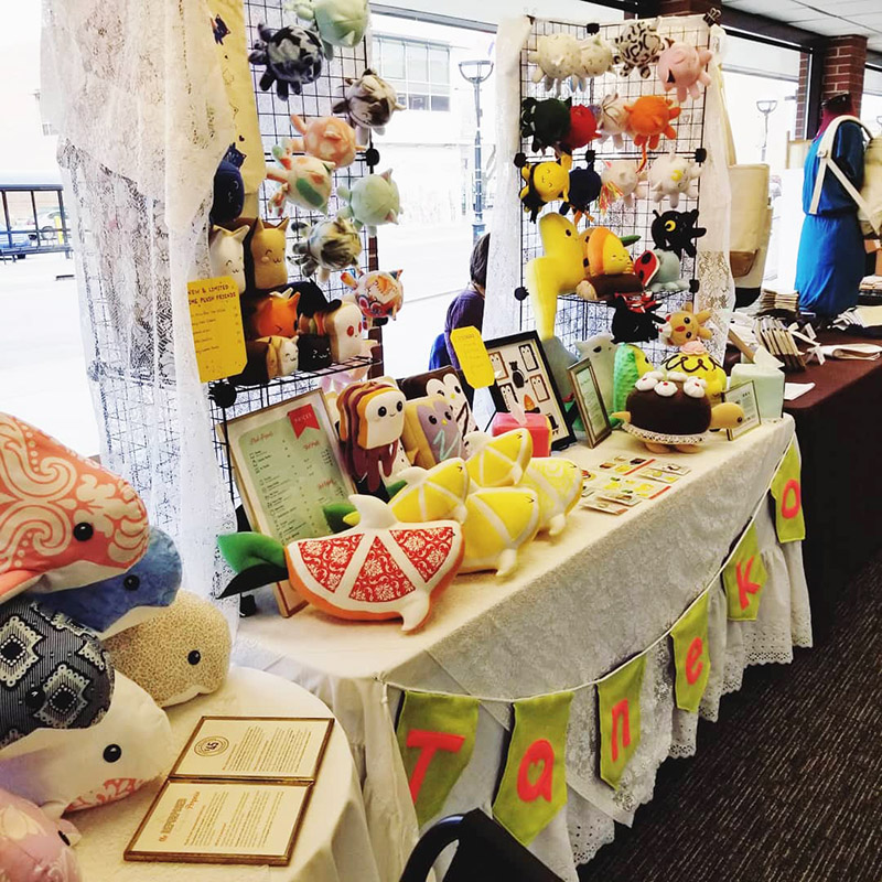 Taneko Says Hello table booth display at Tiny Expo