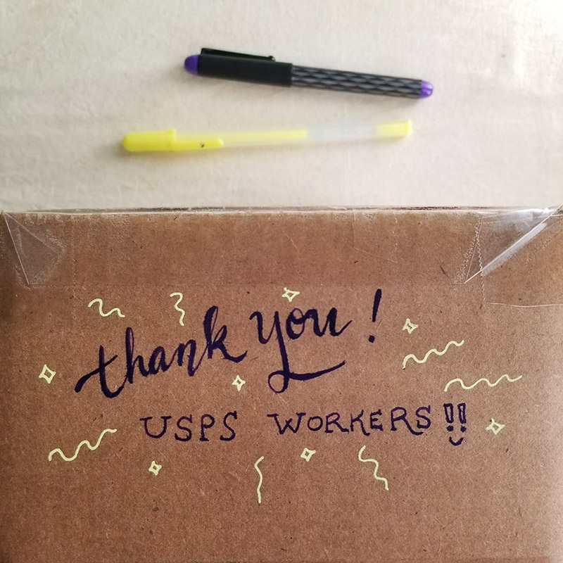 thank you message to USPS handwritten on a shipping box