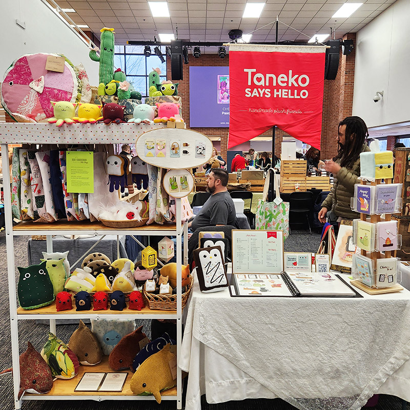 Taneko Says Hello table booth display at Tiny Expo
