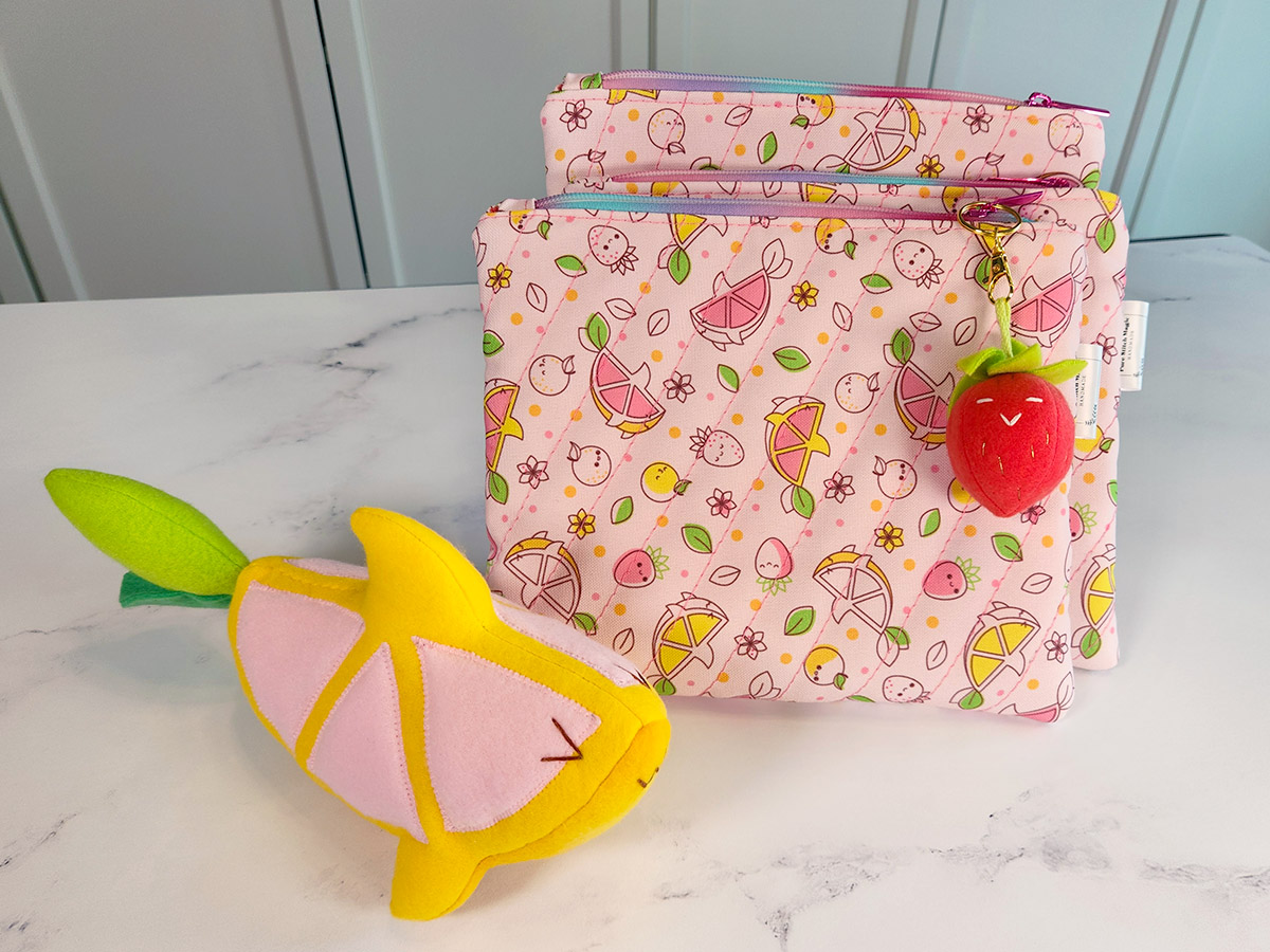 handmade padded bags and book sleeve featuring Pink Lemonade Shark surface pattern art // Pure Stitch Magic X Taneko Says Hello